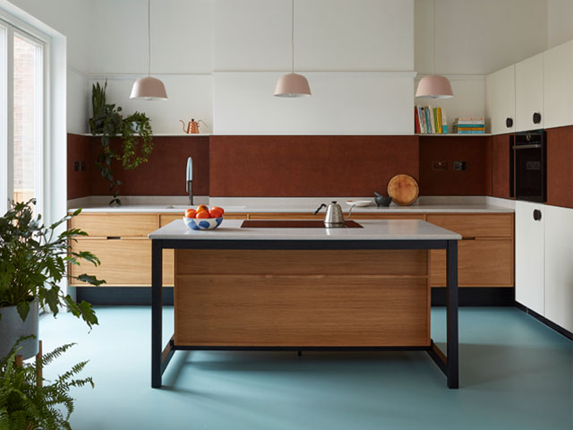 cork tiles and floor planks are renewable and sustainable, shown here in a kitchen upstand and wraparound 