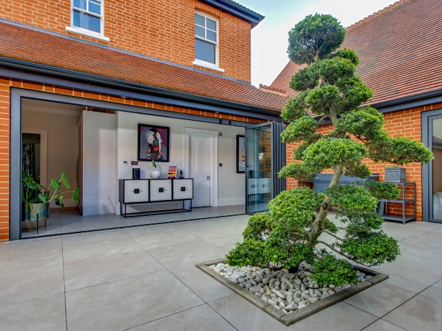 extension opening up onto a courtyard with sliding doors