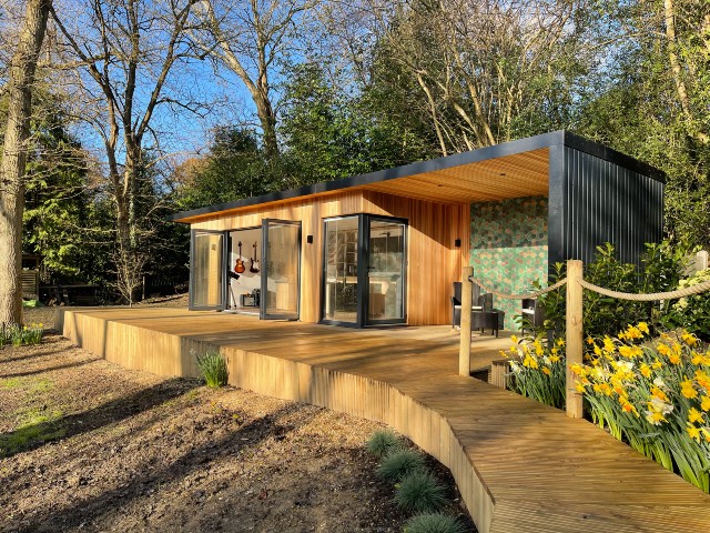 an insulated garden office with terrace for use all year round
