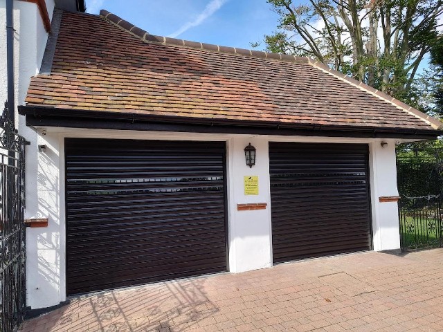 solar powered roller garage doors on a double garage