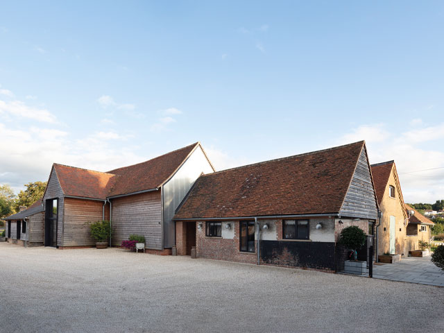farm building conversion ideas: series of converted barns and sheds in Watford