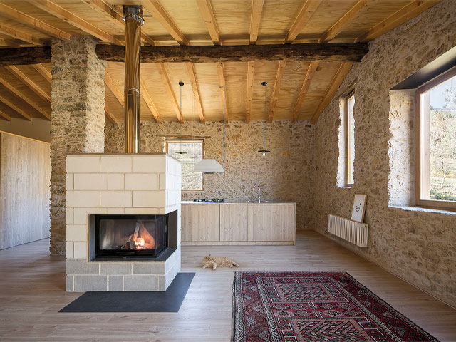 farm building conversion ideas: stone barn conversion with exposed brickwork in Spain