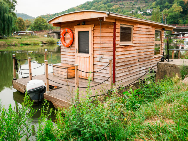 a houseboat is an ideal option for free-spirited adventurers who like to move around 