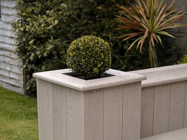 composite decking design ideas: a planter is the perfect finishing touch for your patio decking 