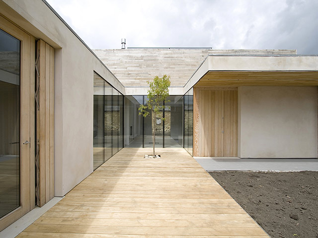 Orchard house courtyard built with natural materials