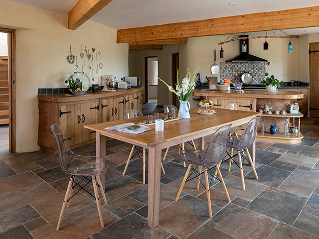Natural materials used inside Grand Designs cob house dining room 