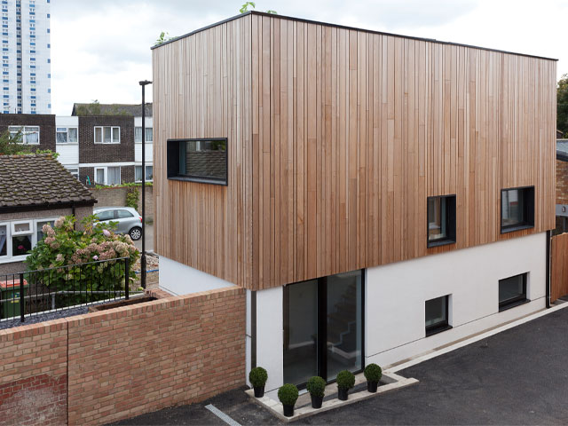 The timber-clad exterior of Joe and Lina's affordable Passivhaus in east London, as featured on Grand Designs in 2017