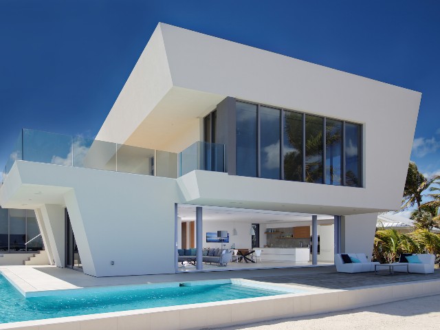 contemporary white brutalist style villa in sunny climate 