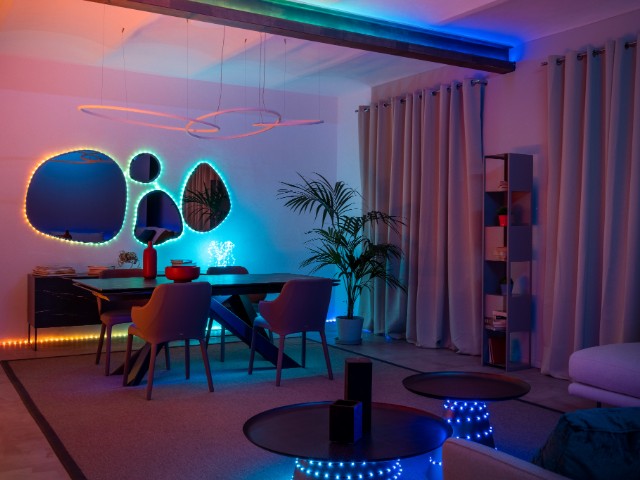 LED decorative lights wrapped around mirrors, coffee tables and running along a skirting board