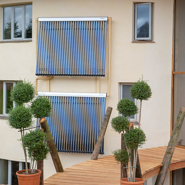 Renewable energy systems solar thermal panels on house in Devon