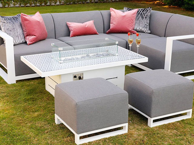 grey outdoor dining table set with corner sofa and stools