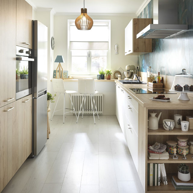 floor-to-ceiling cabinets in a small Scandi-style kitchen