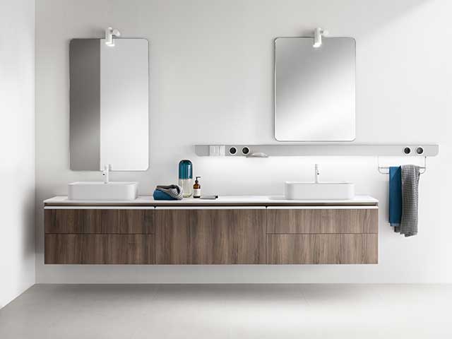 Oak veneer vanity unit with sinks and exposed wood