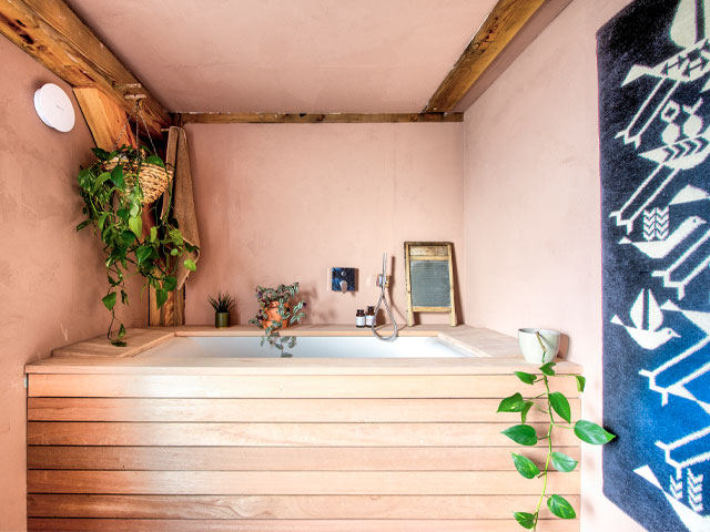 handmade timber bathroom from the American ranch in Grand Designs: The Streets