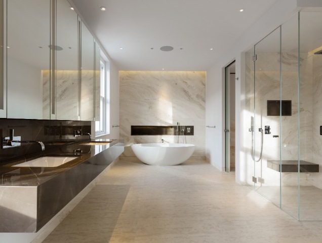luxury bathroom with freestanding oval bath, double walk-in shower and neutral colour scheme