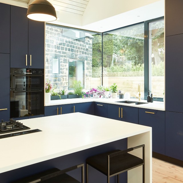Contemporary glazing adds a modern edge to this kitchen extension in a Victorian villa 