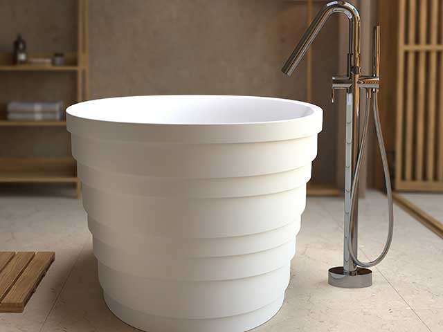 contemporary freestanding wash basin in white porcelain with freestanding tap
