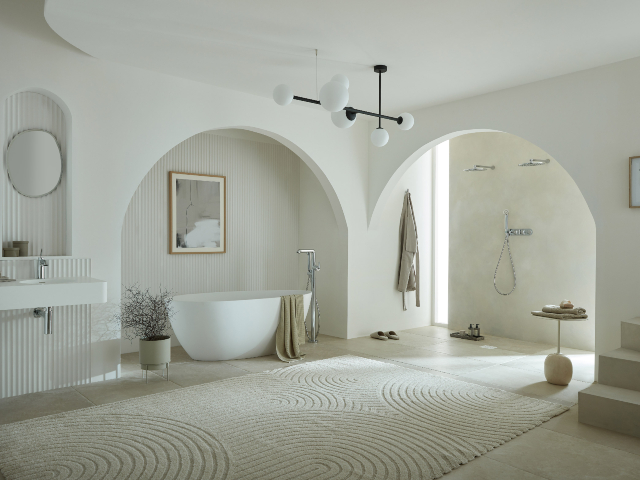 The new VADO x Conran collaboration, Arrondi, in a large modern bathroom decorated in white and neutrals
