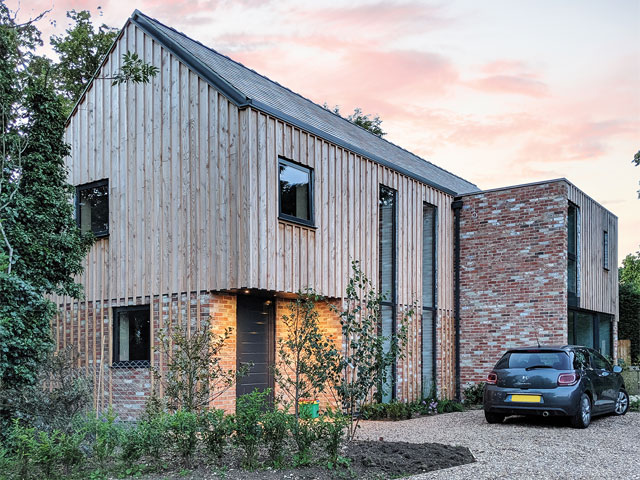 eco-friendly timber home shaped like a barn in lincolnshire 