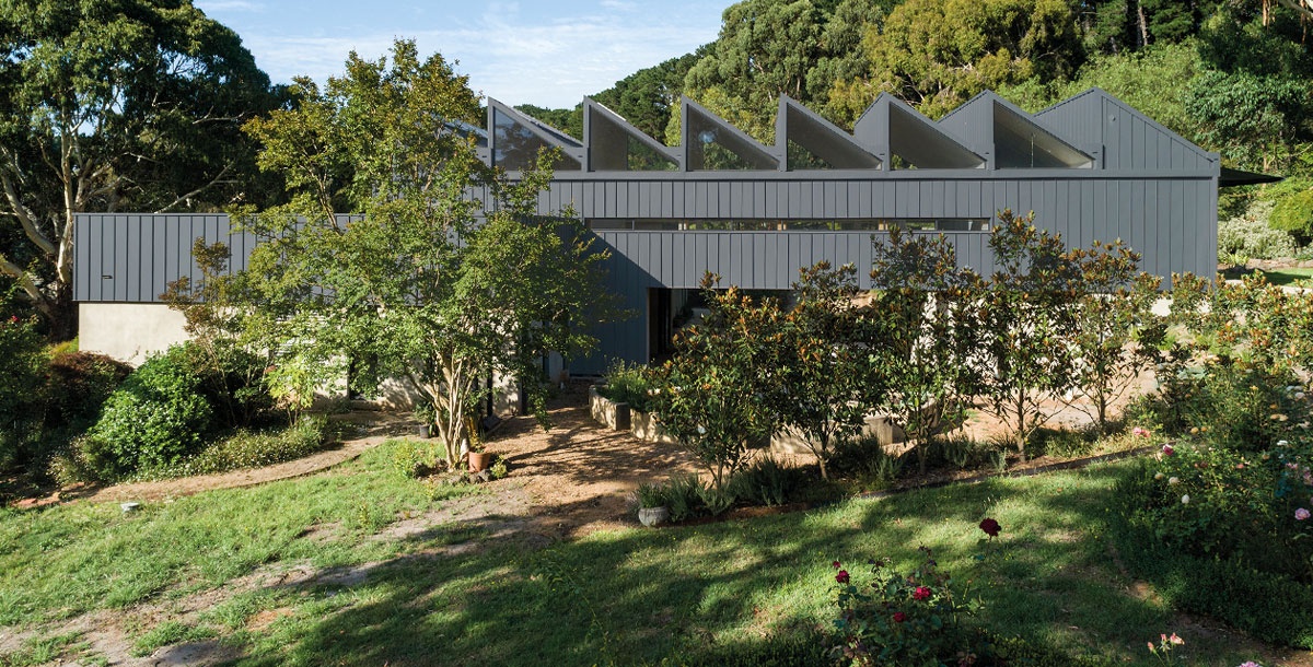 timber home with sawtooth roof in australia