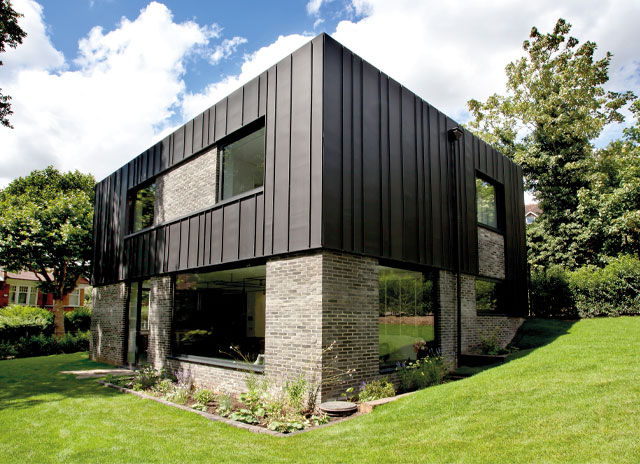 The black zinc-clad extension on the Grand Designs Victorian gatehouse in Haringey, north London