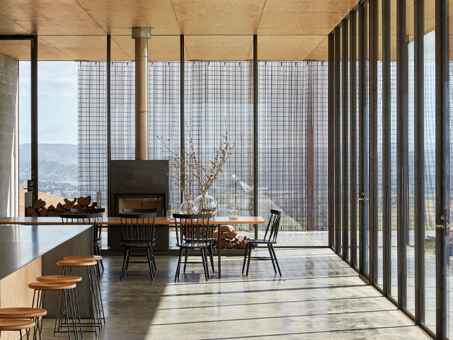 Off-grid house in the foothills of the Victorian Alps built of thermally efficient steel, concrete block and glass