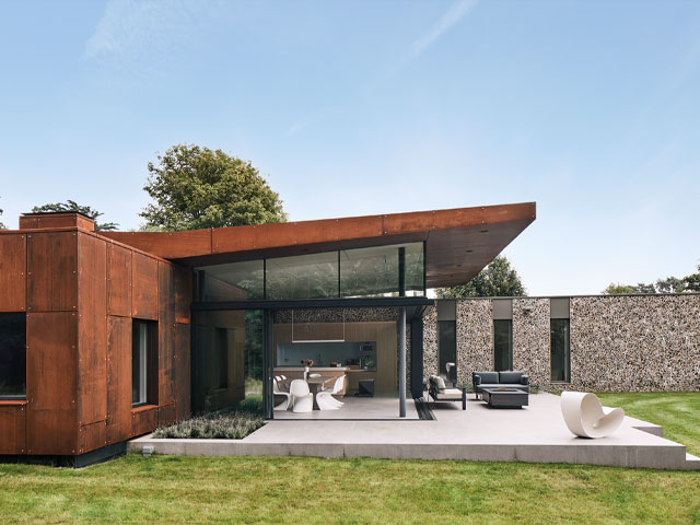 weathering steel walls and knapped flint in North Norfolk, Hudson Architects