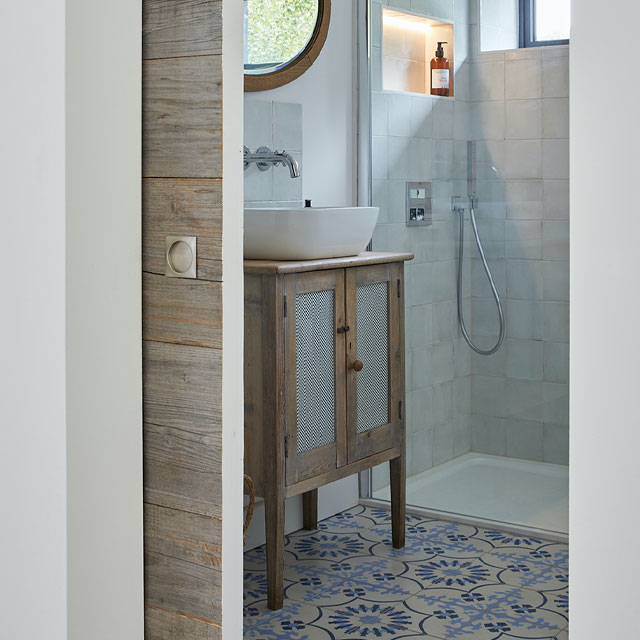 simple small bathroom ideas: sliding pocket doors save space