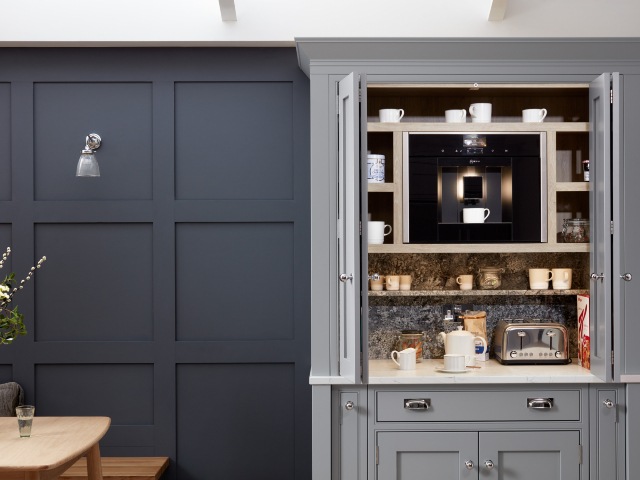 bespoke coffee station cupboard painted dove grey with coffee machine, toaster, tea, coffee and breakfast cereals