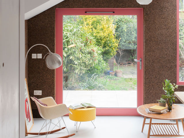 eco insulation: cork cladding used inside and out on a rear extension in lewisham