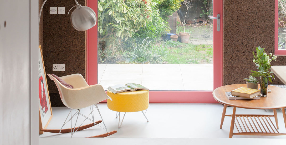 eco insulation: cork cladding used inside and out on a rear extension in lewisham