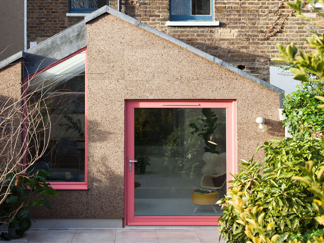 eco insulation: cork cladding used inside and out on a rear extension in lewisham