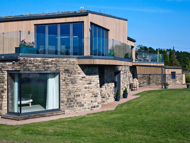 Grand Designs Bolton revisit: green roof and natural materials help the home blend into the surrounding countryside