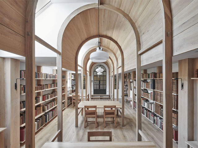 The Cowshed in Dorset was transformed by Crawshaw Architects into a home with a Palladian-style library space