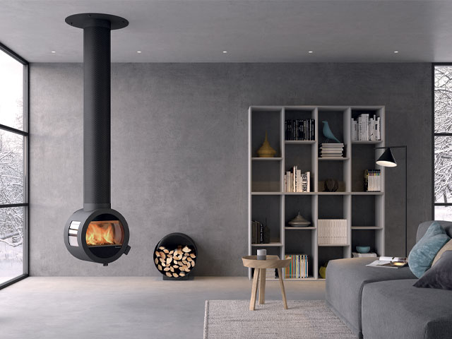 ceiling suspended circular stove in grey living room with large crittall-style windows