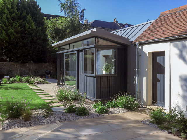 timbre and glass extension to a grade ii listed arts and crafts home in bristol