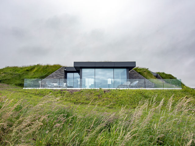 Former military station home with large windows. Photo: Douglas Gibb