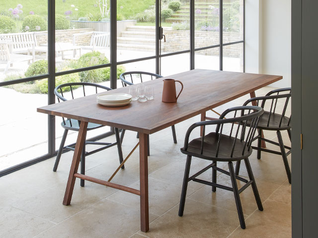 midcentury modern style room with sleek furniture and crittall-style windows