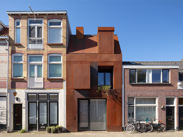 Corten steel enveloped townhouse in Ulrect, Netherlands. Photo: Stijnstijl Fotografie.