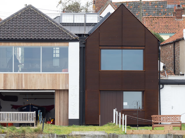 new build home built to look like old cottages in a coastal area in norfolk