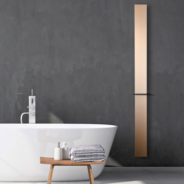copper coloured tall electric bathroom radiator with smart valve