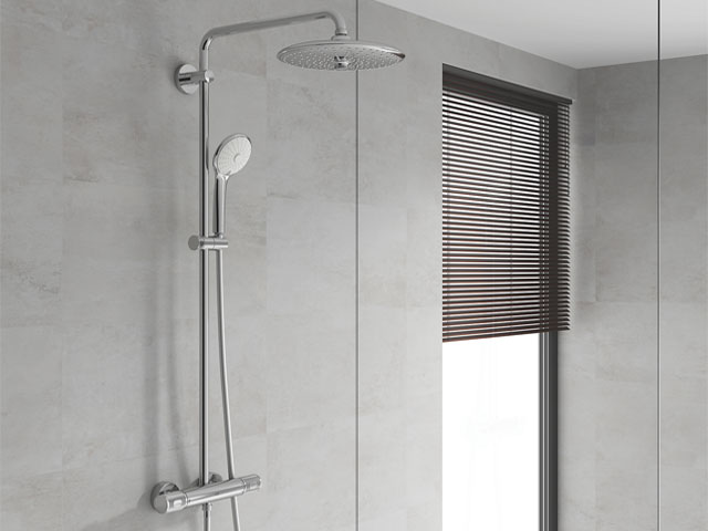 chrome energy-efficient shower with two shower heads and modern technology to help save water in the bathroom