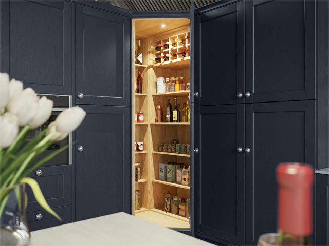 corner pantry with dark blue painted cabinets and internal lighting