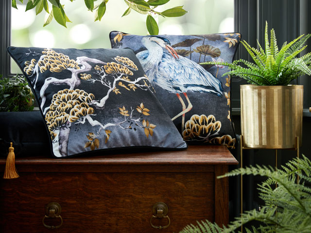 maximalist decor - grey and gold cushions featuring oriental prints