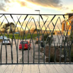 bespoke black metal balcony railings sculpted in the shape of reeds