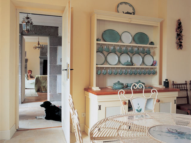 The Grand Designs French manor country kitchen with mantlepiece