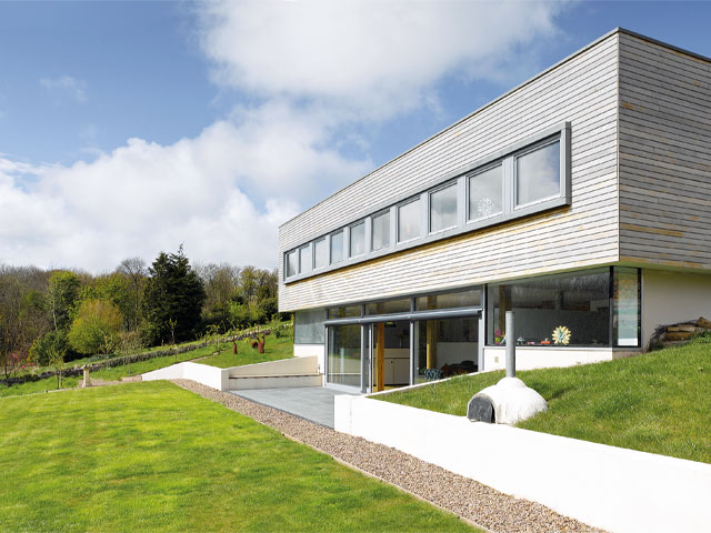 Wood clad passivhaus in Scotland. Climate Change Committee. 