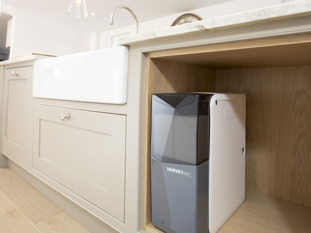 Harvey Water Softener under a kitchen sink