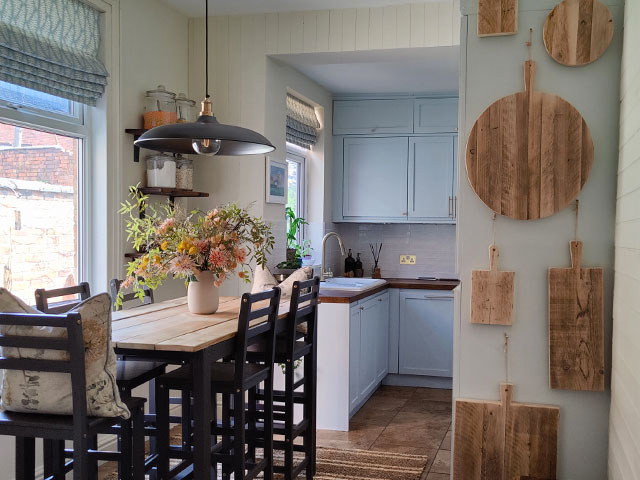 oversized industrial pendant light in a country-style kitchen