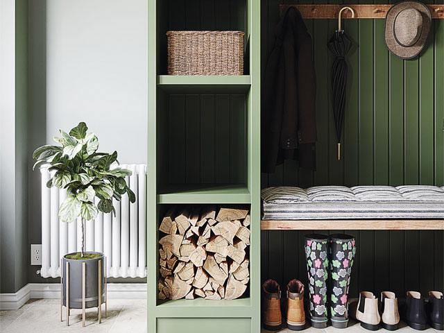 light green storage area with chopped wood and shoe storage wicker basket